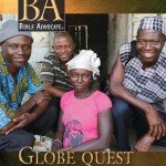 Group of people smiling outside a building, with the Bible Advocate cover text Globe Quest...to bless all peoples.